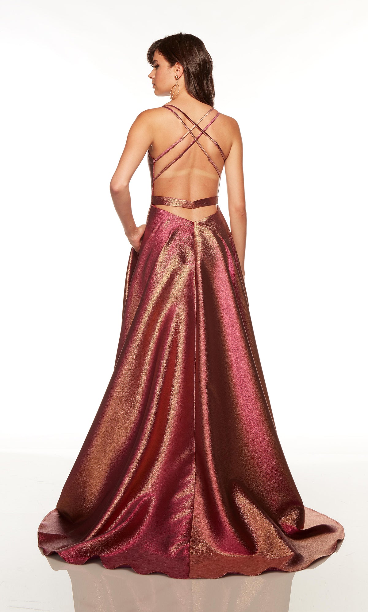 Pink and gold unique prom dress with an adjustable strappy back and train.