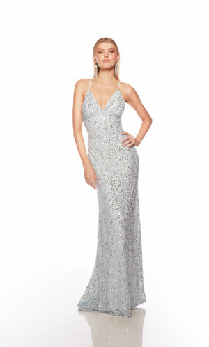 Light blue sequin gown with an V neckline, slit, and crisscross adjustable strap back, and an slight train for an elegant and alluring look.