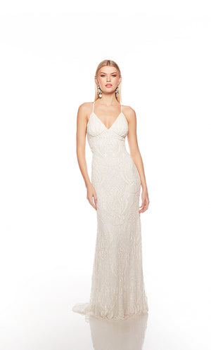 Elegant ivory formal gown: Hand-beaded, V neckline, spaghetti straps, strappy back, and intricate paisley-patterned design for an chic and sophisticated look.