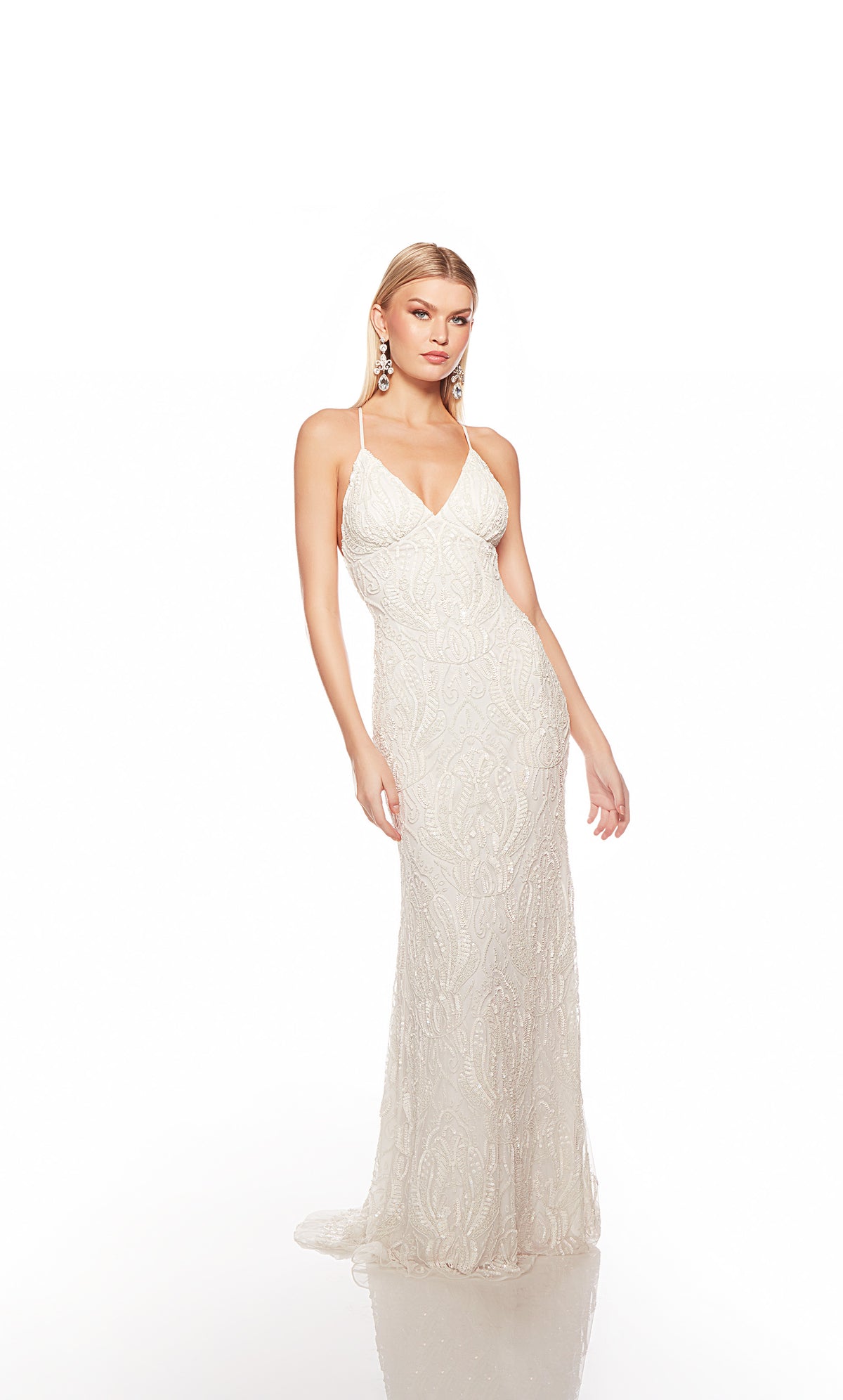 Elegant ivory formal gown: Hand-beaded, V neckline, spaghetti straps, strappy back, and intricate paisley-patterned design for an chic and sophisticated look.